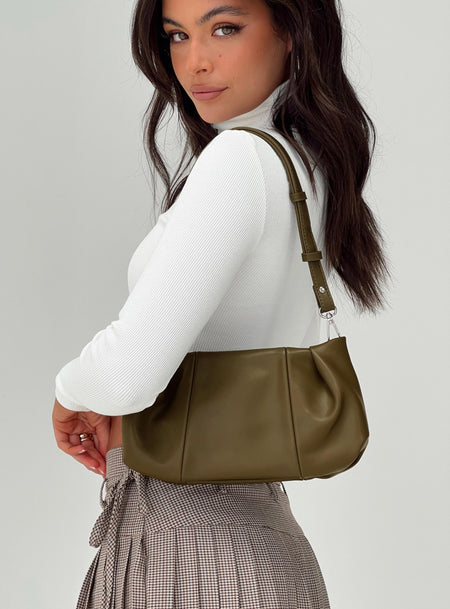 Faux leather shoulder bag Adjustable shoulder strap, magnetic button fastening, internal slip & zip pockets
