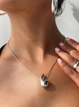 Necklace  Silver-toned dainty chain, drop charm  Lobster clasp fastening, adjustable length 