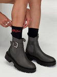 Faux suede boots Rounded toe, pull tab, treaded sole, silver-toned buckles Elasticated gusset at side, padded footbed