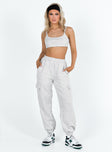 Matching set Crop top Fixed shoulder straps Scooped neckline Invisible zip fastening at side Track pants High rise Elasticated waistband Twin hip pockets Straight leg Extra cargo style leg pockets Elasticated cuff