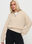 front view of model wearing Princess Polly Fireheart Zip Through Knit Sweater Beige Cropped 