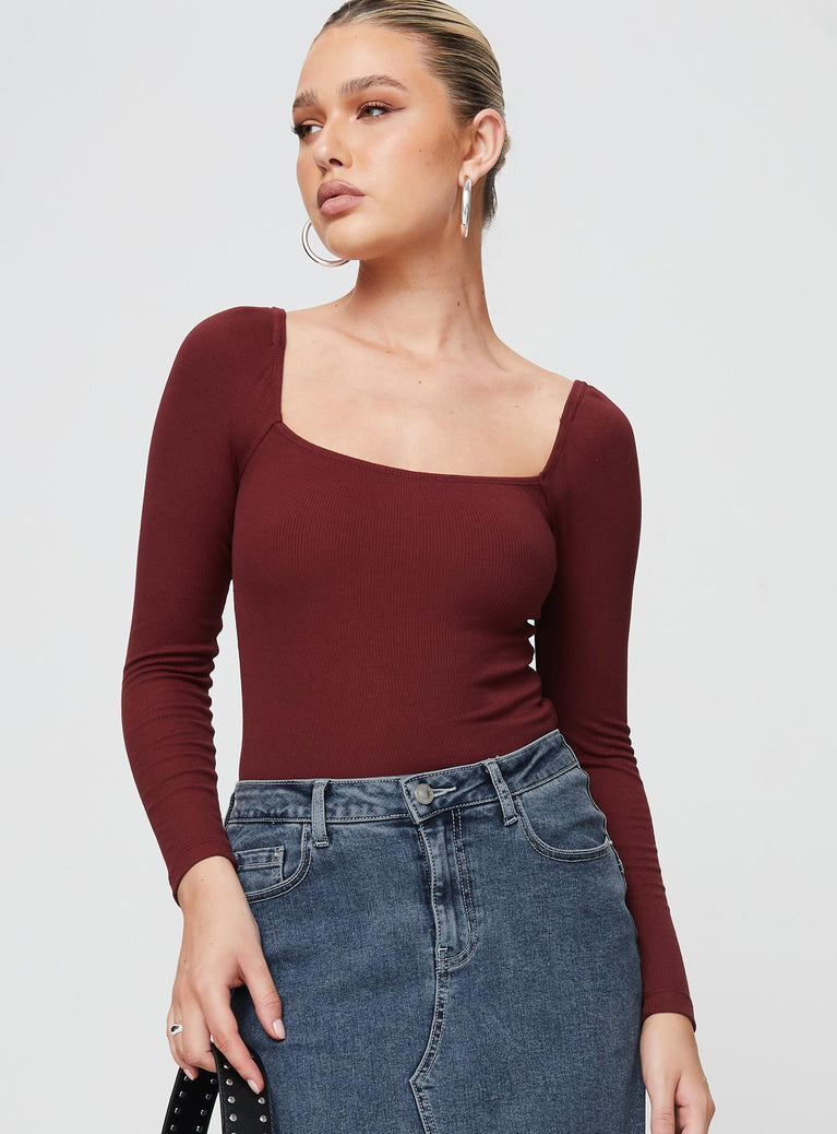 Bodysuit Slim fitting, ribbed material, wide square neck, high cut leg, cheeky style bottom Internal silicon strip along the shoulder, press clip fastening at base