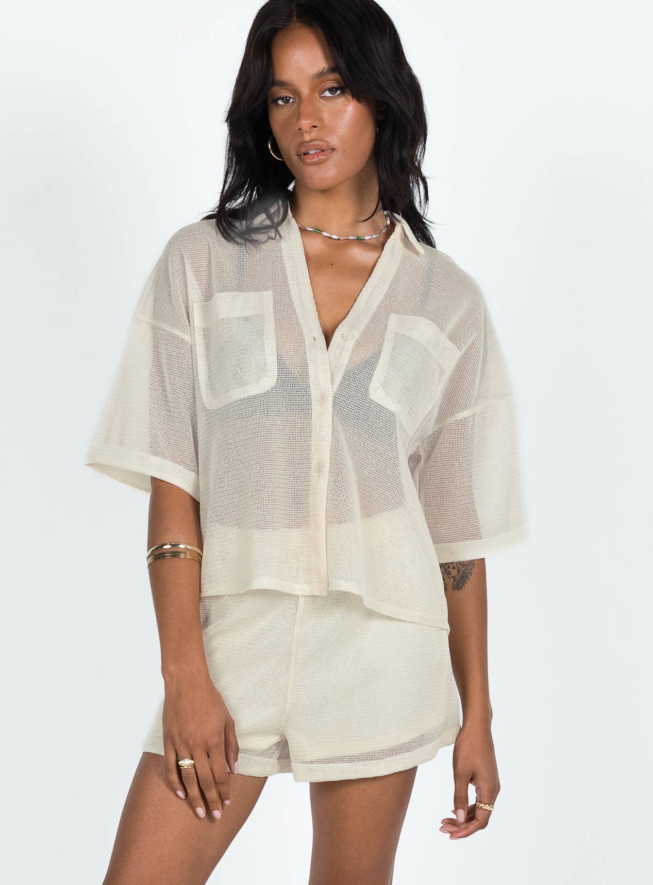 Matching set Sheer material Button up shirt Classic collar Button fastening at front Drop shoulder  Twin chest pockets Shorts High rise Elasticated waistband
