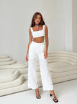Matching set Broderie anglaise material Crop top Invisible zip fastening at side High waisted pants Wide leg Belt looped waist Zip and button fastening