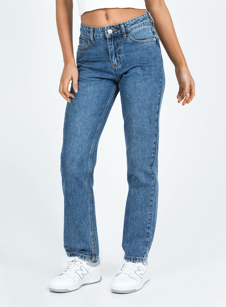 Jeans Mid wash denim Belt looped waist Classic five pocket design Branded patch at back Slim leg