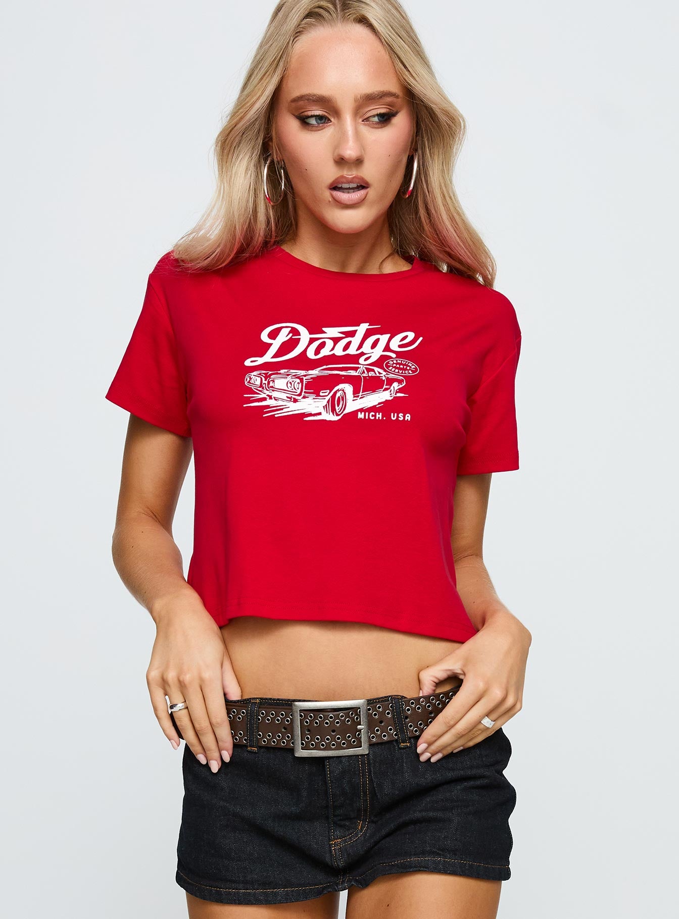 front view of model wearing Princess Polly Dodge Classic Graphic Top Red Short Sleeves Crew Neck 
