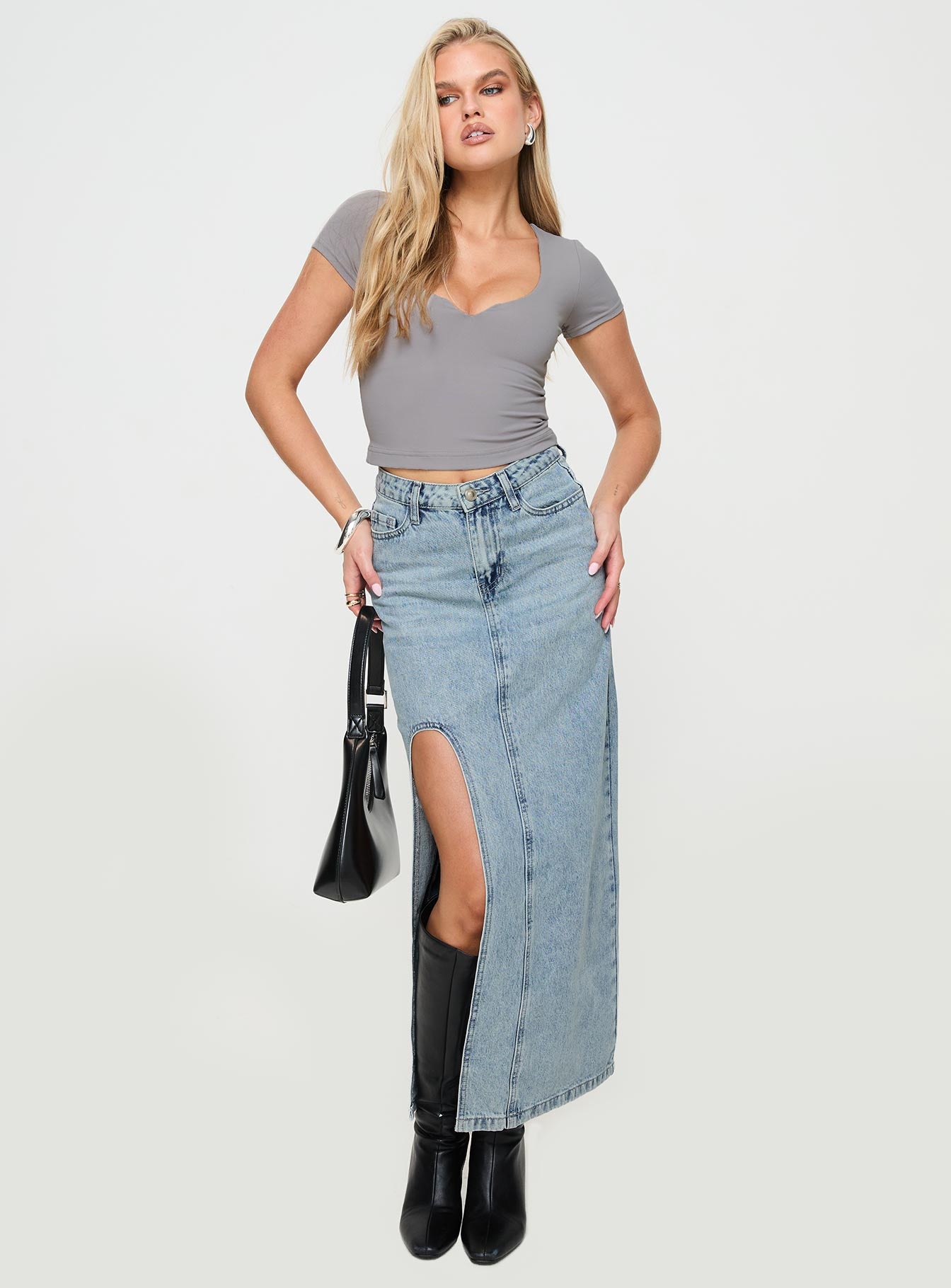   front view of model wearing Princess Polly Saige Denim Maxi Skirt Light Wash Maxi 