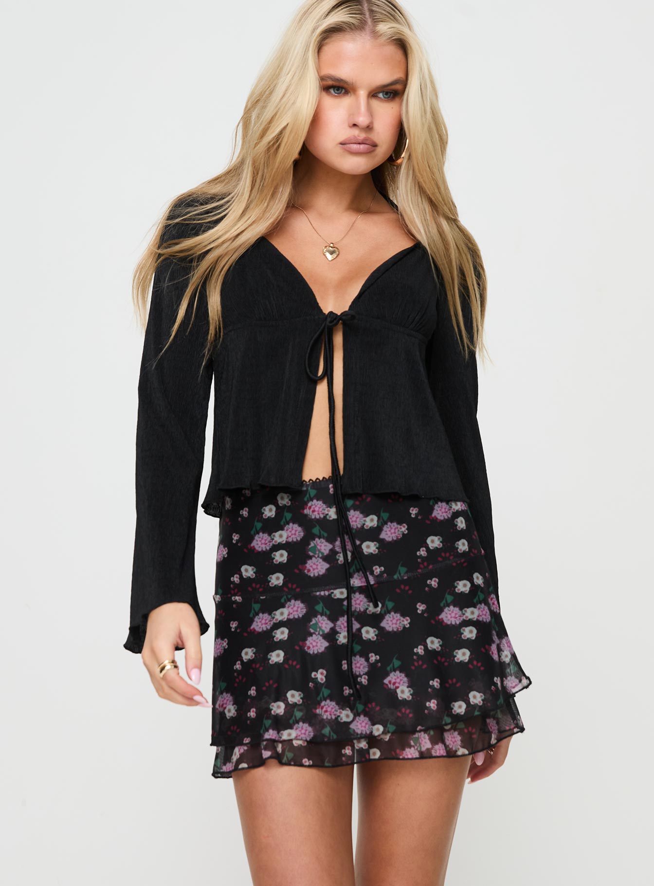   front view of model wearing Princess Polly Sunny Skies Mini Skirt Black Floral Mini Skirts 