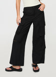 front view of model wearing Princess Polly Humphrey Cargo Pant Black Mid Rise 