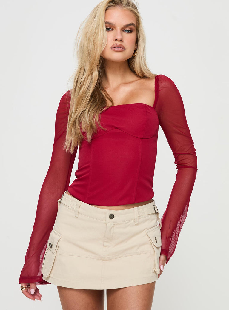 Red Long sleeve top Inner silicone strip at bust, boning through waist, zip fastening at back