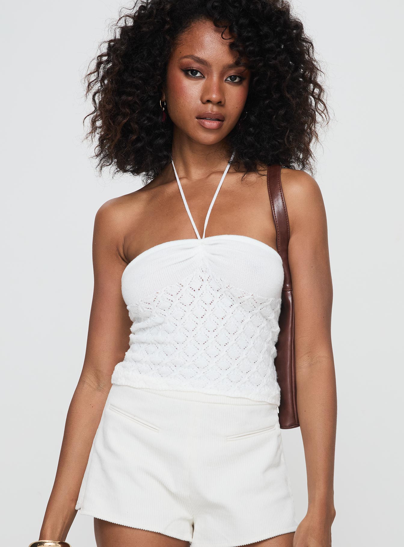 back view of model wearing Princess Polly Kaptan Top White Sleeveless Sweetheart 