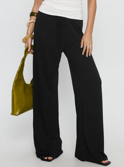 front view of model wearing Princess Polly Gavrielle Jersey Wide Leg Pants Black High Rise Pants 