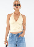 Crop top Fixed halter strap Good stretch Lined bust