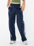 Windbreaker pants, mid rise Elasticated waistband, twin hip pockets, zip fastening at hem