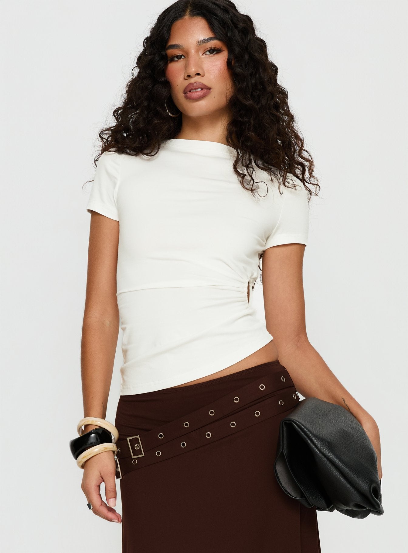  front view of model wearing Princess Polly Lorensa Double Buckle Asymmetrical Midi Skirt Brown Midi Skirts 