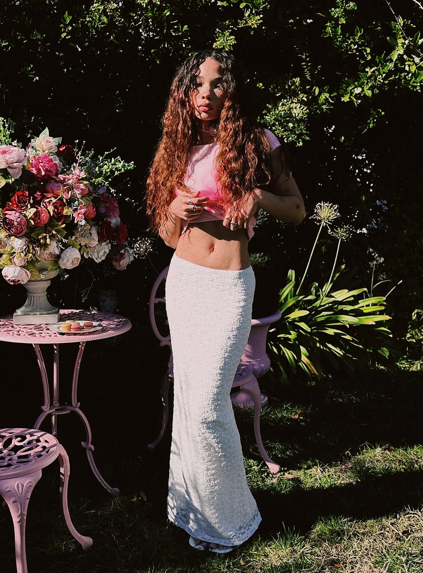   side view of model wearing Princess Polly Venices Maxi Skirt Cream Maxi 