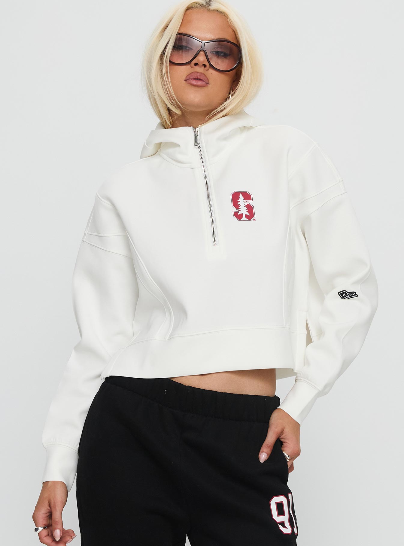 front view of model wearing Princess Polly Stanford Buttersport Half-zip Hoodie White cropped 