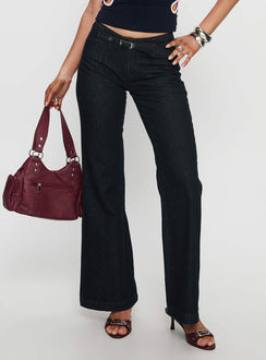 side view of model wearing Princess Polly Slow Ride Mid Rise Bootleg Belted Jeans Dark Indigo Blue Mid Rise Jeans 