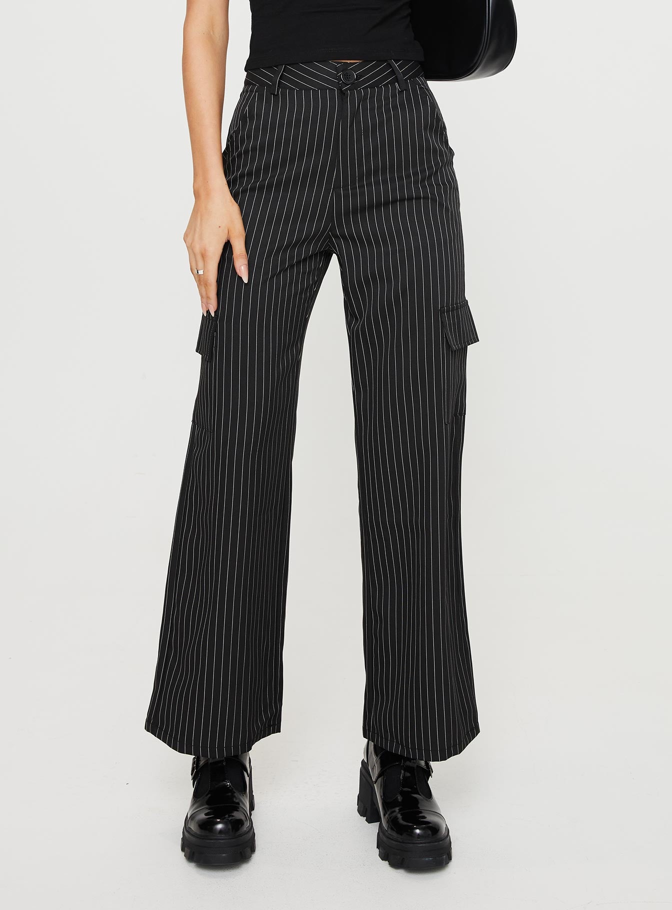Front view of model wearing  front Princess Polly High Waisted Pants  Katow Cargo Pants Black Stripe
