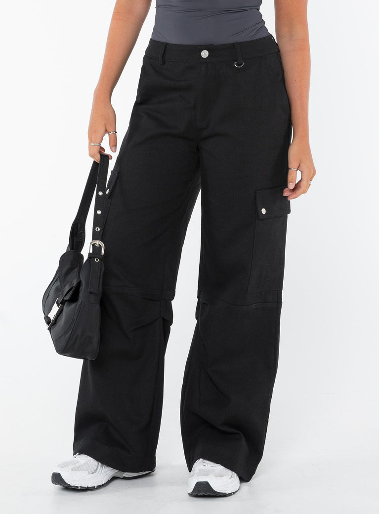 Mid-rise Cargo pants  Relaxed fit, Zip & button fastening, Belt looped waist, Classic hip pockets, Press button leg and back pockets, Wide leg 