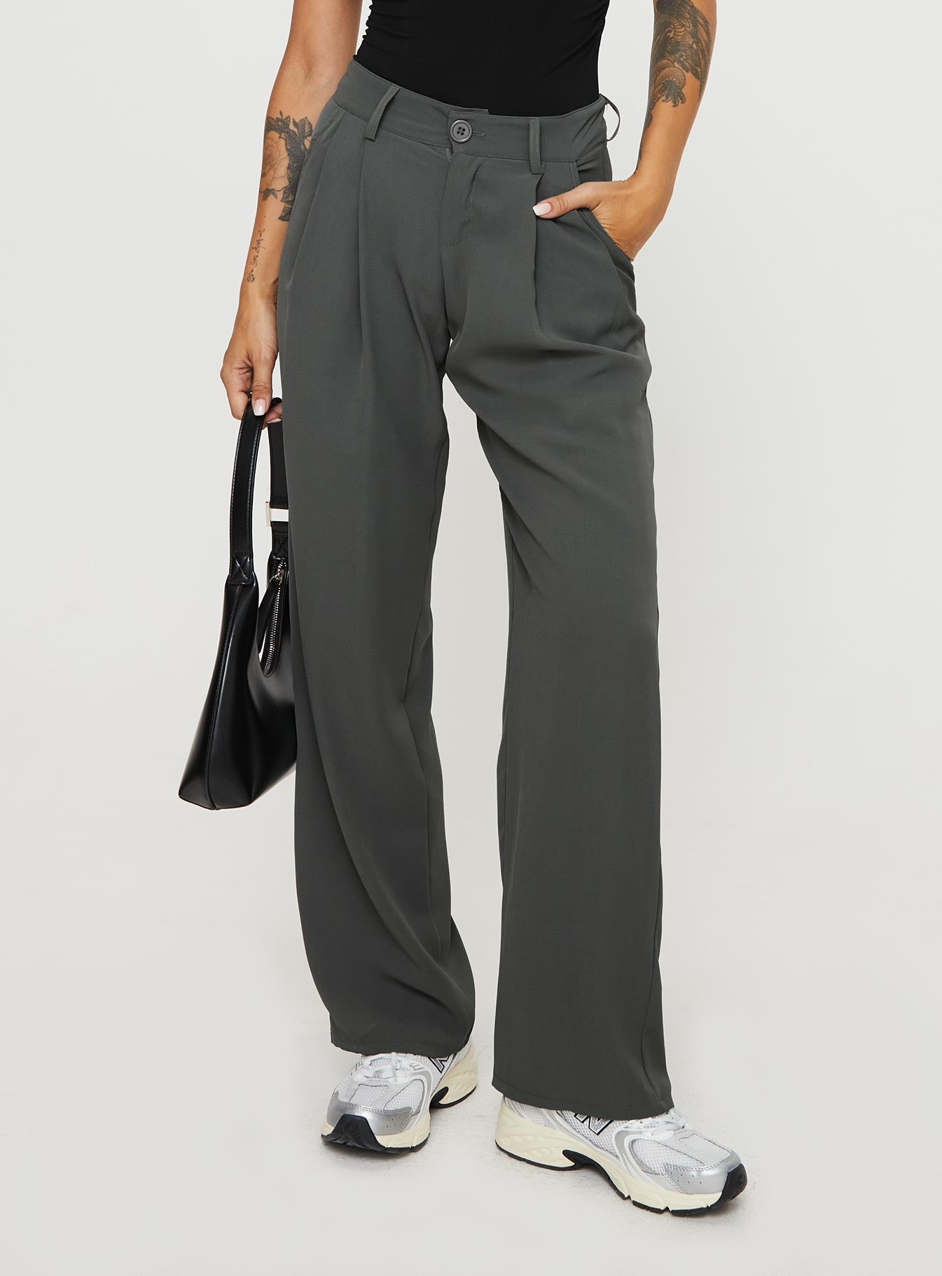 front view of model wearing Princess Polly Nikkey Low Rise Pants Slate Mid Rise 