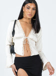 Front view of model wearing  front Princess Polly Full Sleeves Square Neck  Hunton Long Sleeve Top Cream