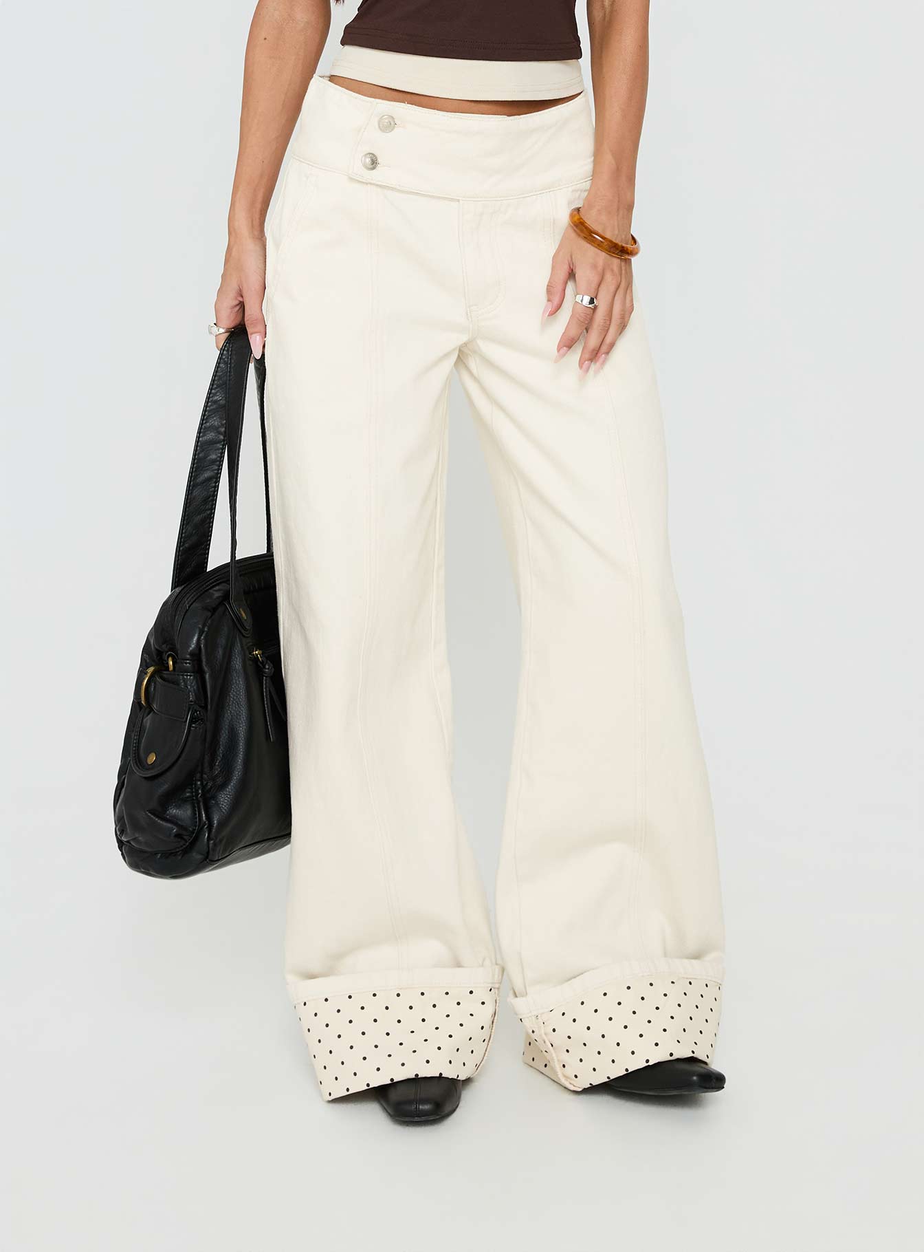 front view of model wearing Princess Polly Nikoletta Foldover Jeans Cream / Polka Mid Rise Jeans 