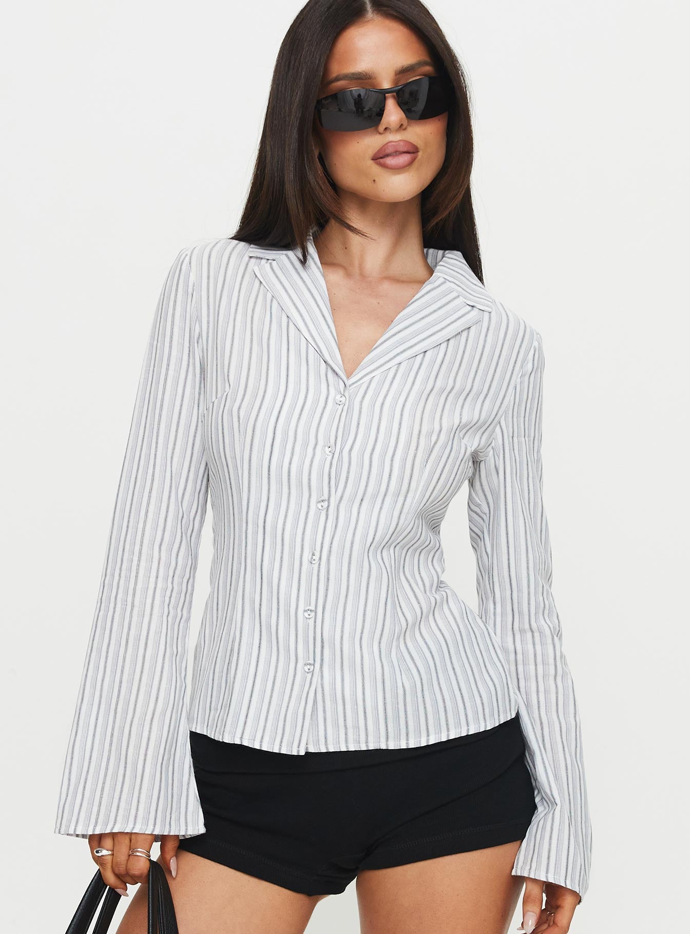front view of model wearing Princess Polly Myers Stripe Top White Full Sleeves V-Neck 