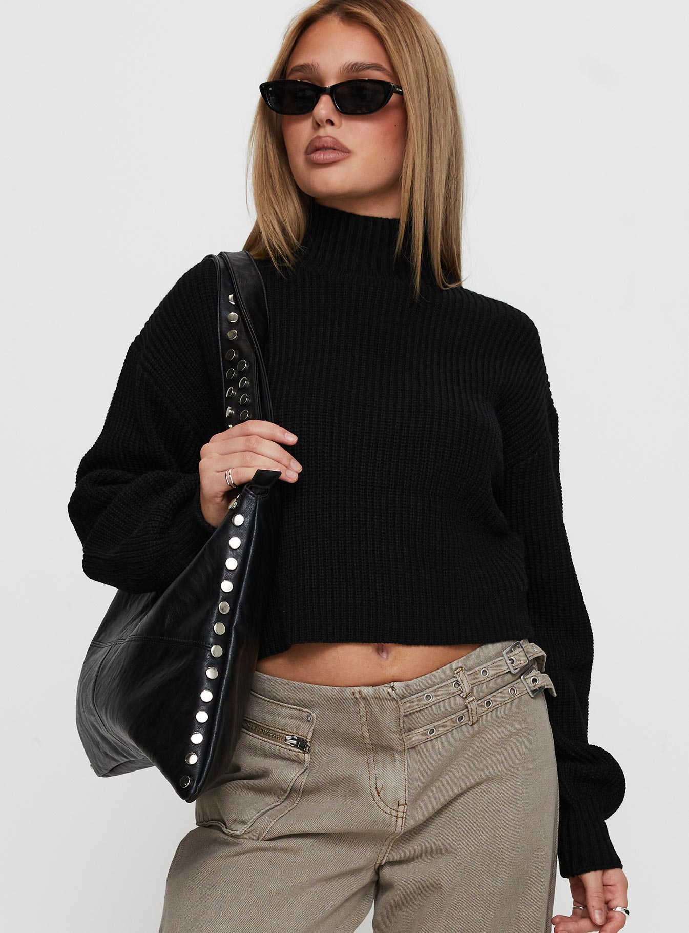 front view of model wearing Princess Polly Sayge Mock Neck Knit Sweater Black cropped 