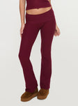 back view of model wearing Princess Polly Closed Eyes Flared Pants Maroon Low Rise Pants 