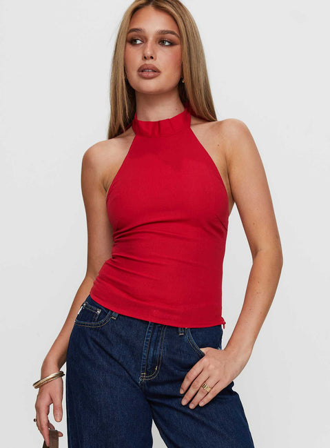 front view of model wearing Princess Polly Merril Halter Top Red Sleeveless High Neck 