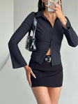 Front view of model wearing  front Princess Polly Full Sleeves High Neck  Anni Pinstripe Shirt Black