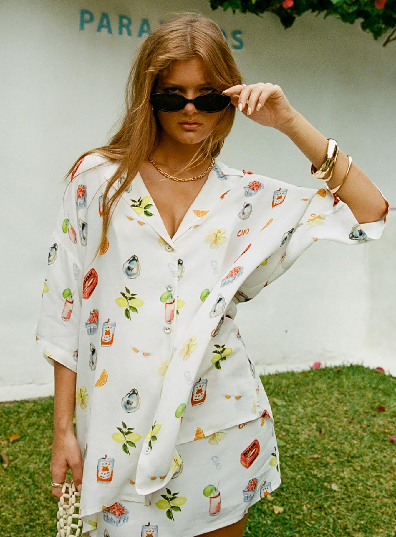 front view of model wearing Princess Polly Caraliia Shirt White / Multi Three Fourth Sleeves V-Neck 