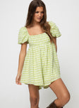 Playsuit, gingham print  Square neckline, puff sleeves, elasticated shoulders and back, rushed back band Invisible zip fastening at back, inner silicone strip at bust