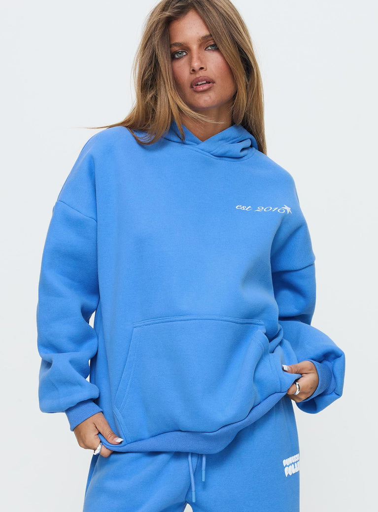 front view of model wearing Princess Polly Princess Polly Hooded Sweatshirt Bubble Text Blue / White Long 