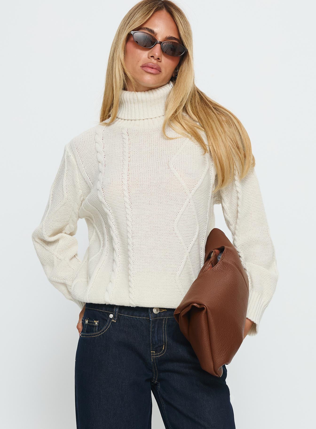 front view of model wearing Princess Polly Tarynne Cable Knit Turtle Neck Sweater Beige Long 