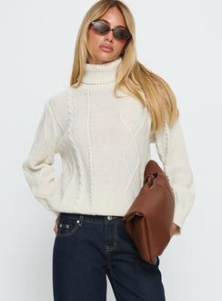 front view of model wearing Princess Polly Tarynne Cable Knit Turtle Neck Sweater Beige Long 