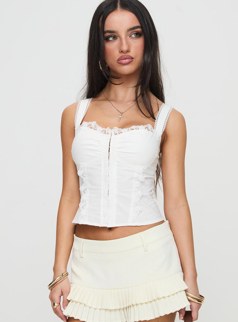 front view of model wearing Princess Polly Hatching Top White Sleeveless Sweetheart 