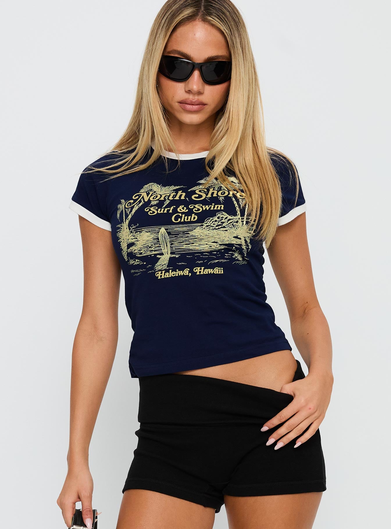 front view of model wearing Princess Polly North Shore Graphic Top Blue Short Sleeves Crew Neck 