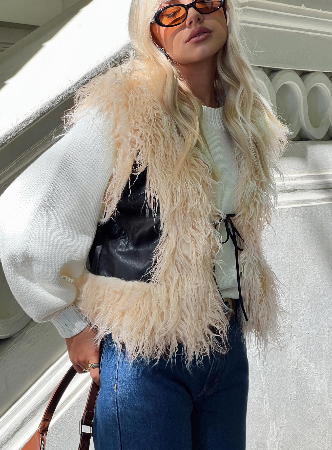 Vest  Faux leather & faux shearling, open front style, tie fastening at front  Non-stretch, lined