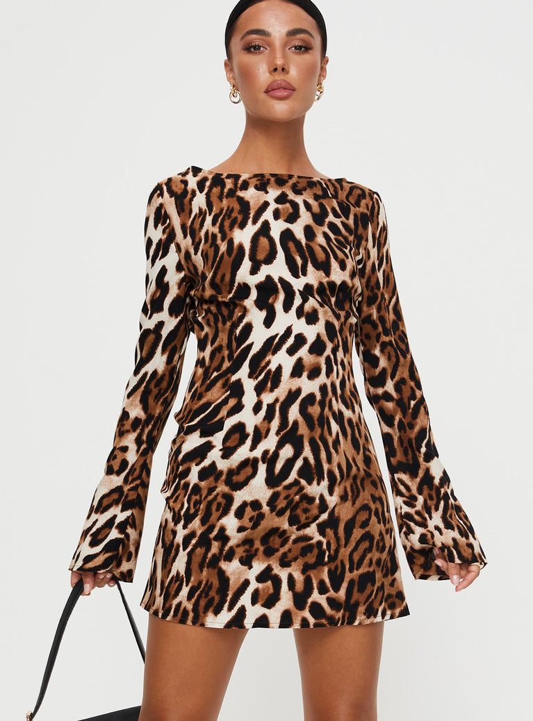 Leopard print Mini dress High wide neckline, long slight flared sleeves, curved hem, open low back, back neck tie fastening, invisible zip fastening at back