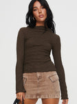 Front view of model wearing  front Princess Polly Full Sleeves High Neck  Danvers Long Sleeve Top Brown