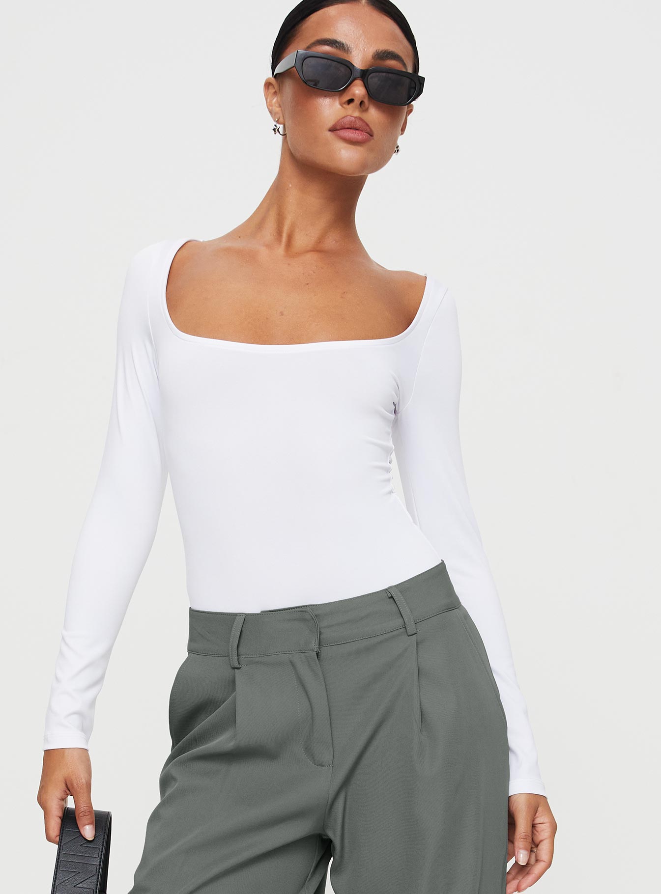 front view of model wearing Princess Polly Ellery Bodysuit White Full Sleeves Square Neck 