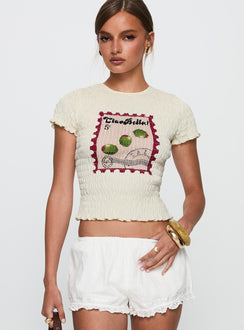 front view of model wearing Princess Polly Ciao Bella Shirred Graphic Top Cream Short Sleeves Crew Neck 