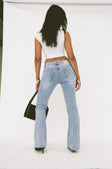 back view of model wearing Princess Polly Bethany Bootleg Low Rise Jeans Light Wash Low Rise Jeans 