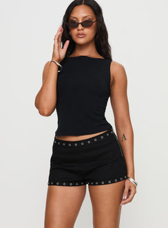 side view of model wearing Princess Polly Houdini Eyelet Mini Short Black Low Rise Shorts 