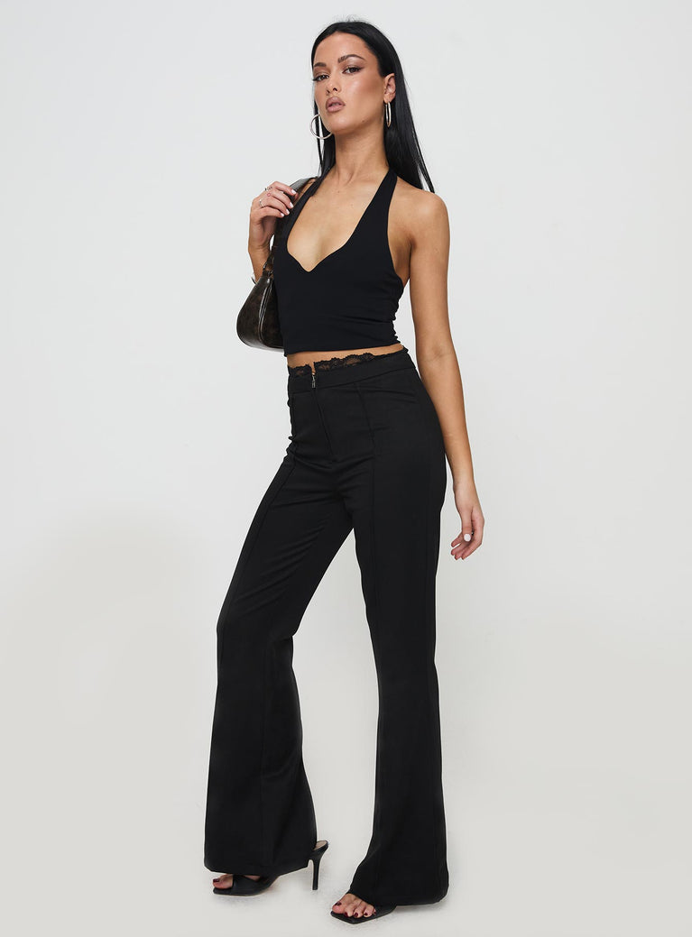 front view of model wearing Princess Polly Stellina Slim Fit Flared Pants Black High Waisted Pants 