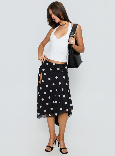  front view of model wearing Princess Polly Dulciana High Split Asymmetrical Midi Skirt Black / Polka Dot Midi Skirts 