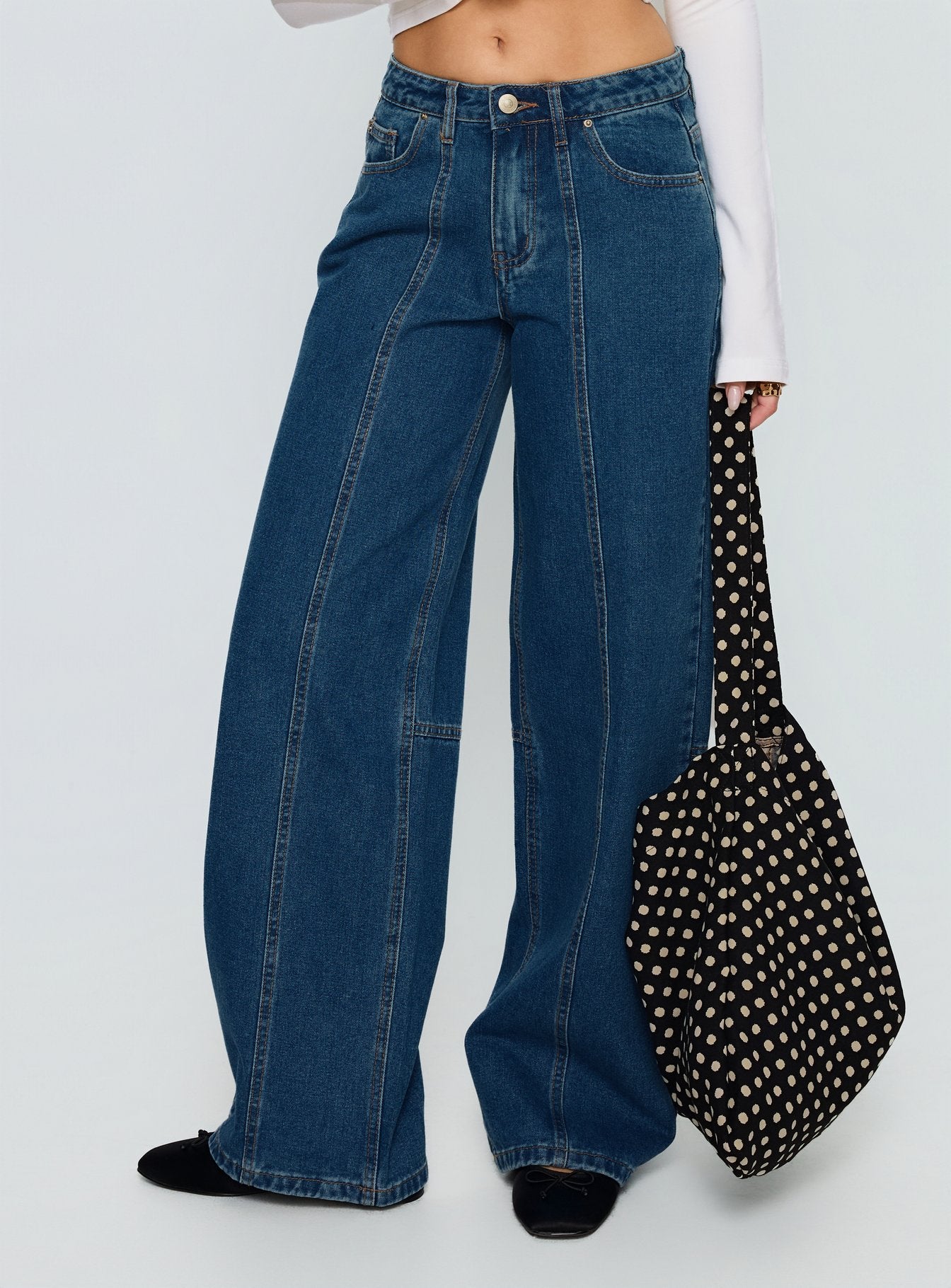 front view of model wearing Princess Polly Lando Low Rise Straight Leg Jeans Mid Blue Wash Mid Rise Jeans 