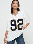 front view of model wearing Princess Polly 92 Charm Top White Half Sleeves V-Neck 